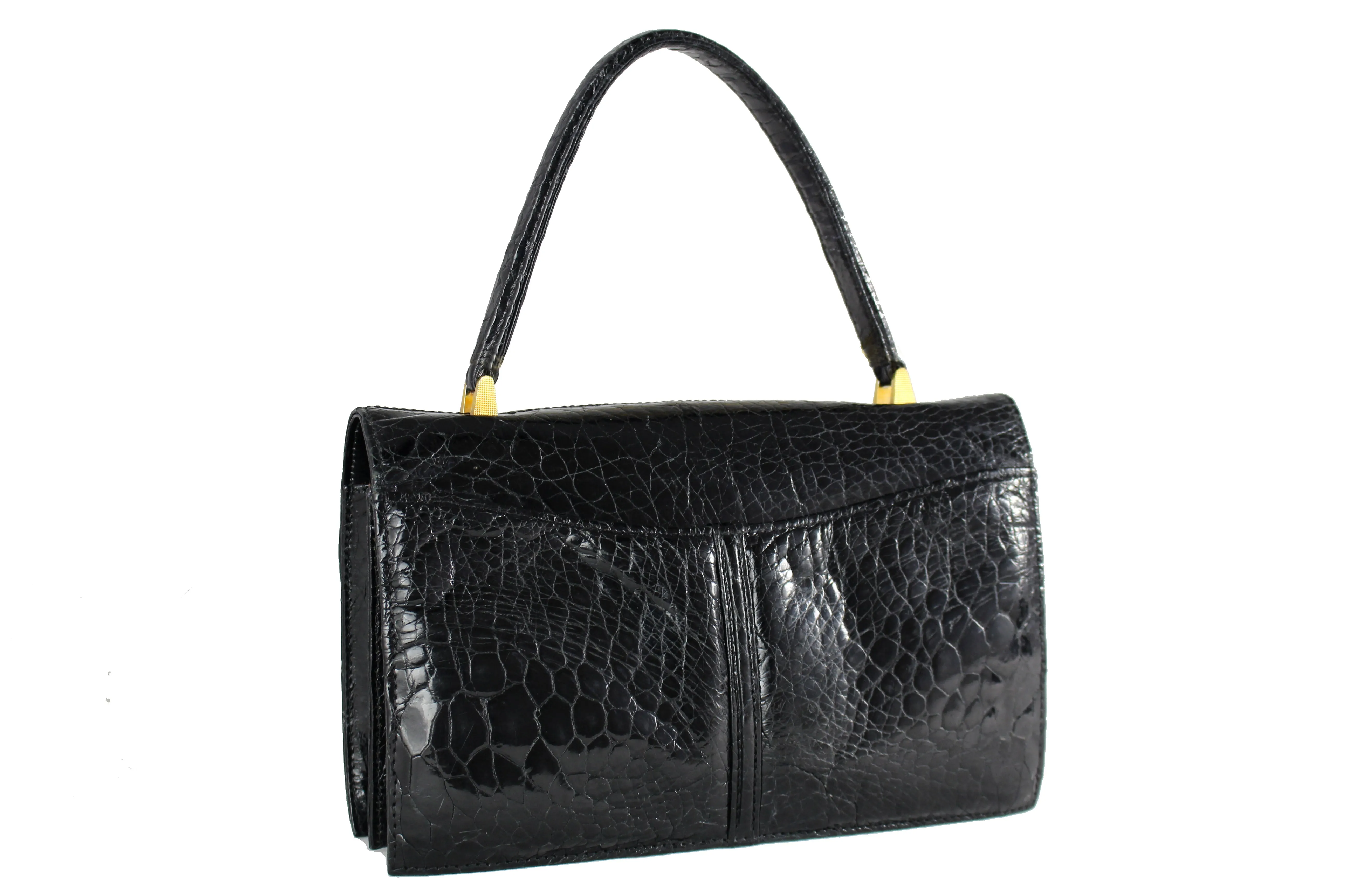 Black turtle skin flap bag with top handle