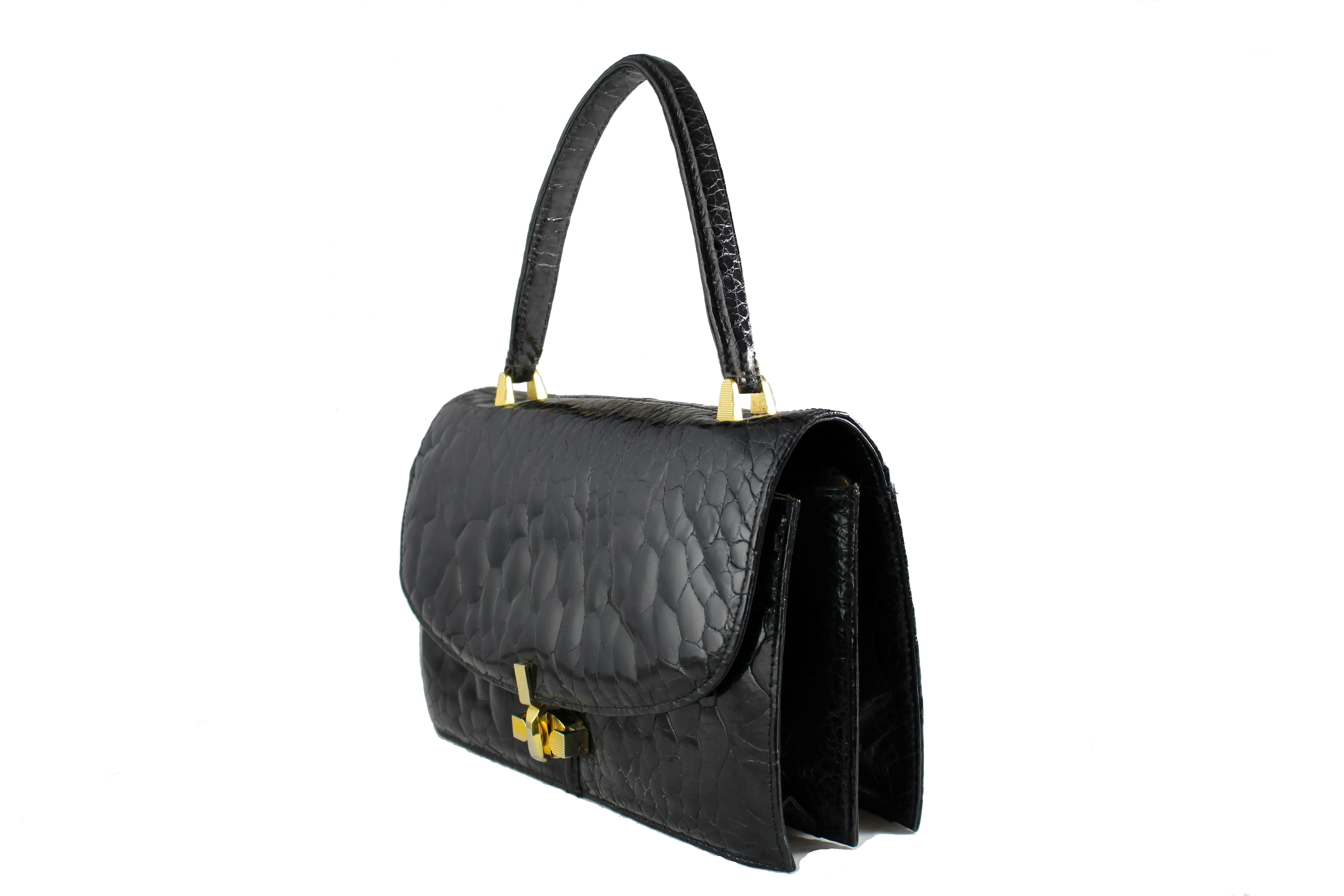 Black turtle skin flap bag with top handle