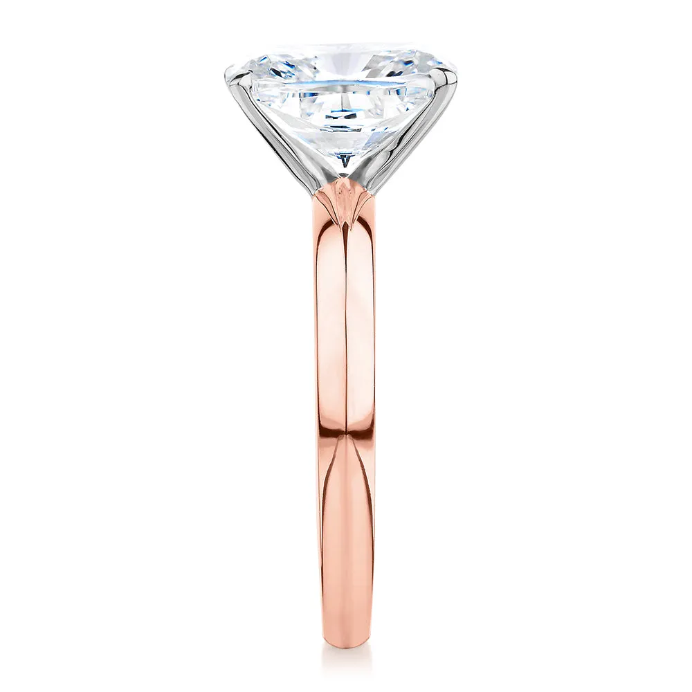 Cushion Radiant solitaire engagement ring with 3.49 carat* diamond simulant in 14 carat rose and white gold