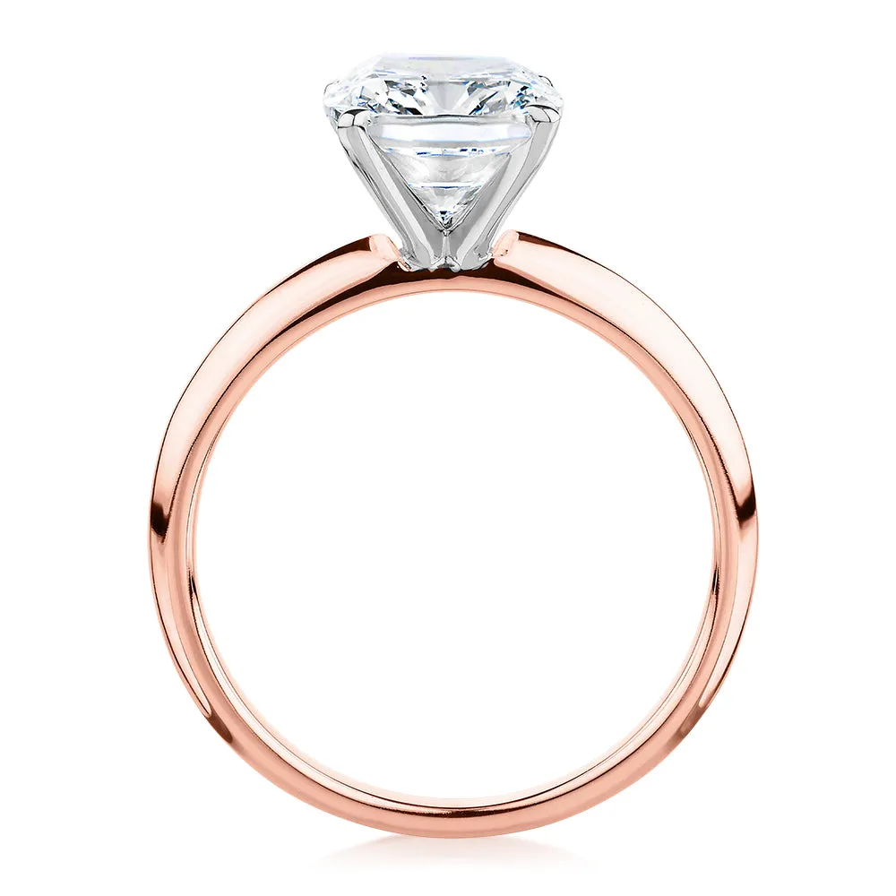 Cushion Radiant solitaire engagement ring with 3.49 carat* diamond simulant in 14 carat rose and white gold
