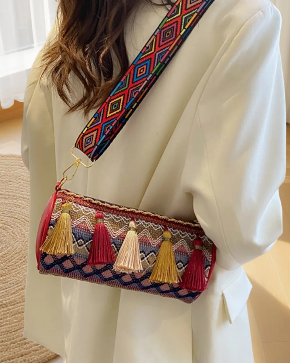 JCBA33003 Ethnic Embroidered Round Barrel Bag with Tassel Details