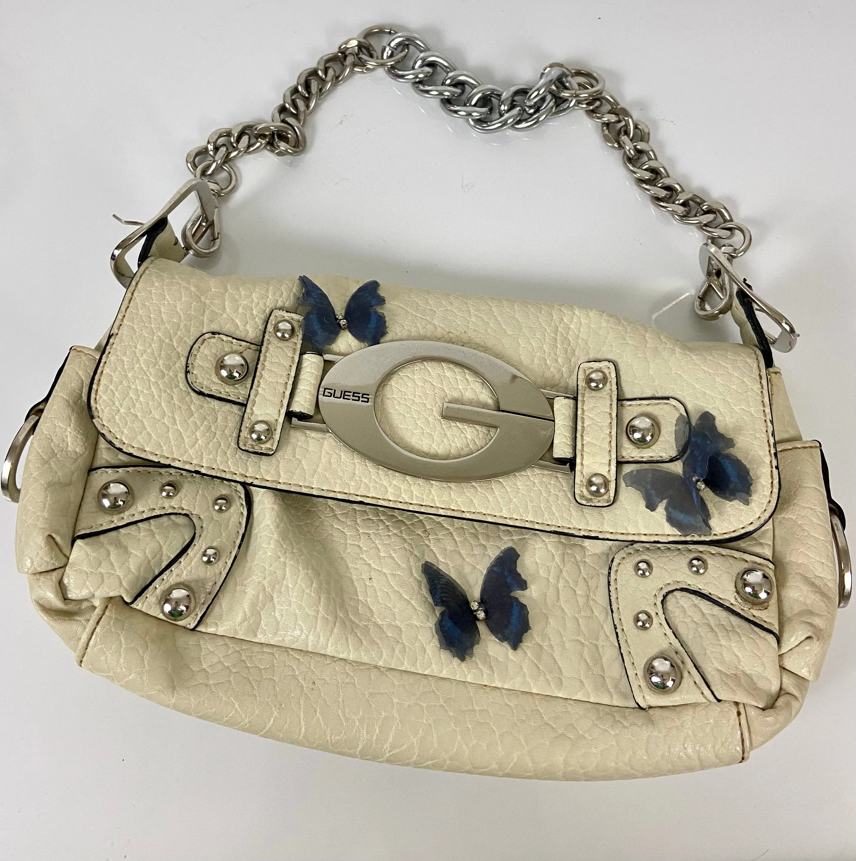 Reworked Vintage Y2k
Guess Studded Shoulder Bag with butterfly 🦋